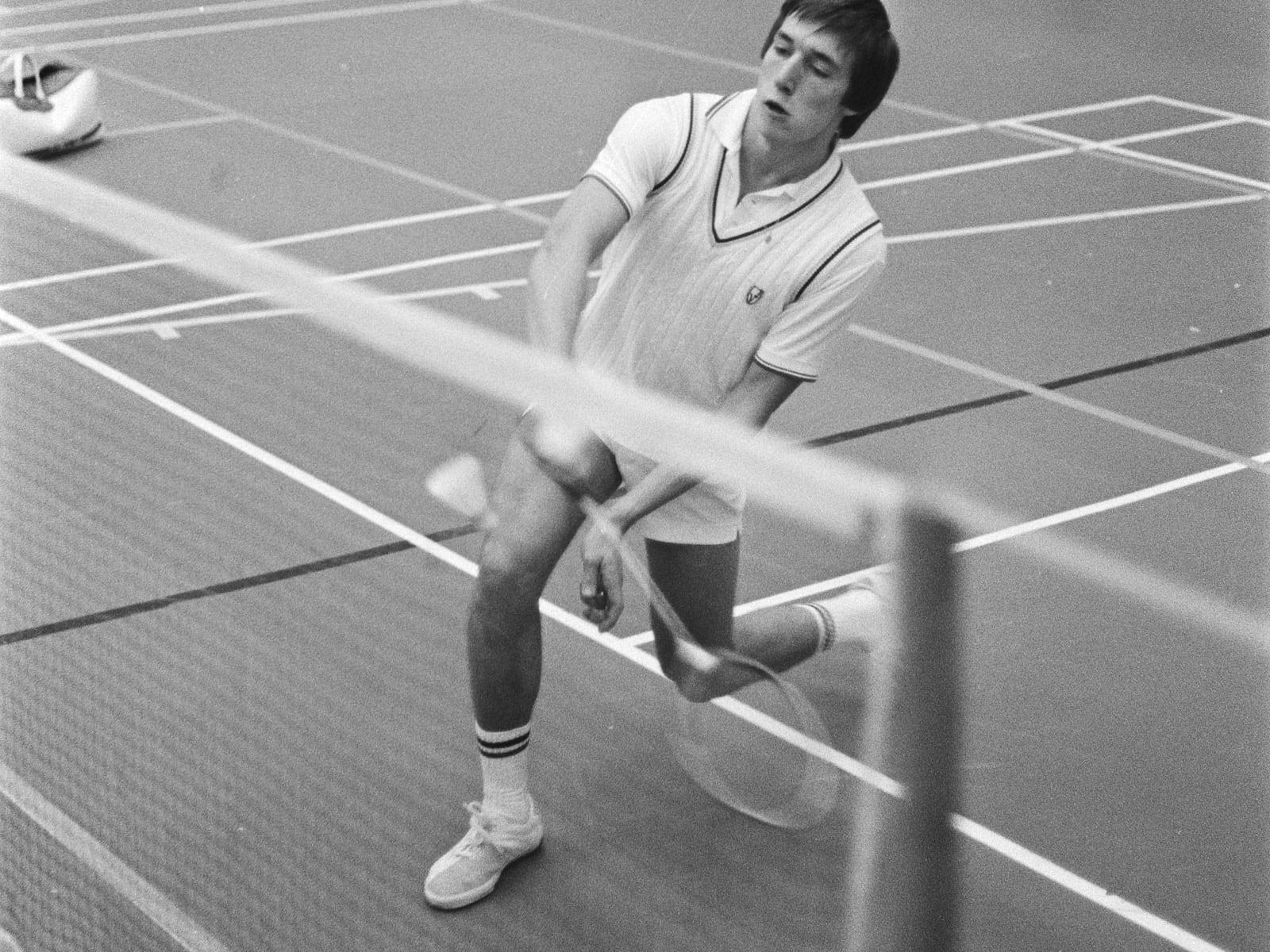 A badminton player receiving at the net, 1976